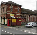 Red phonebox on a Risca corner