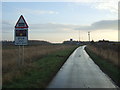 Approaching level crossing on Beswick Road