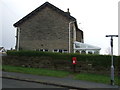 Elizabeth II postbox on Bolton Road, Addingham