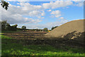 SK6623 : Stockpile of top soil and processing area by Andrew Tatlow