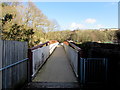 ST0996 : Quakers Yard footbridge over the River Taff by Jaggery