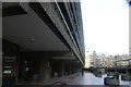 View along the underside of Lauderdale Tower from the Barbican Estate