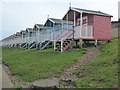 Beach huts alongside Minster Beach Path