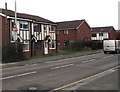 Warning sign - skid risk for 1 mile, Llanidloes Road, Newtown