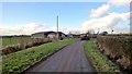 Following a tractor down Woodgate Lane