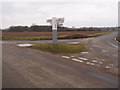 Road junction with grass triangle