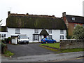SU1480 : Thatched cottage, High Street, Wroughton by Vieve Forward