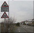 SJ0783 : Warning signs facing Marine Road East, Prestatyn by Jaggery