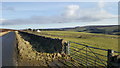 View from the road over fields of Boltshope Park