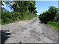 H9730 : Farm access road on the Ballymoyer Weir Road by Eric Jones