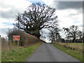 Caution farm entrance