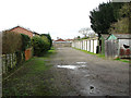 Garages at the back of houses in Wade Close