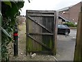 Pokesdown: a gate partially obstructs footpath J12