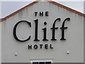 Signage for The Cliff Hotel