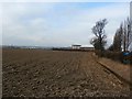 Ploughed Field and College Buildings