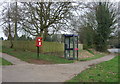 Elizabeth II postbox and telephone box on Tamworth Road, Corley