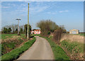 Little Wilbraham: pink house and poles at Frog End