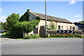 Outbuilding at Cover Bridge Farm viewed across the A6108