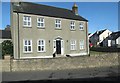 Houses off the A25 at Barnmeen