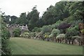 Lawn, border and house at Endsleigh Cottage (now hotel)