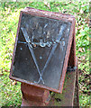 Metal plaque on a mile marker on the Marriott