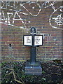 Modern milepost by the Birmingham and Fazeley canal