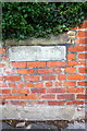 Benchmark on Uplands Road wall