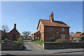 Well head, wash house and 7 and 8 High Road, Manthorpe