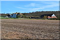 View across stubble field to New Barn Farm