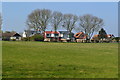 Houses across field