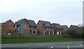 New housing beside Woodhouse Way (A6002)