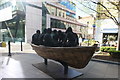 View of a boat and rowers sculpture in Spital Square