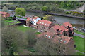 Modern housing beside the River Esk