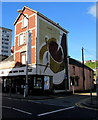 Coffee cup mural on a High Street corner, Swansea