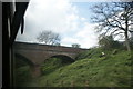 View of a footpath bridge from the Epping to Ongar Railway