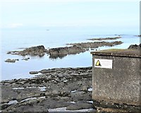 J5082 : "Warning, Danger of Stranding" notice on hut near Seacliff House by Eric Jones