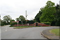 Walled garden, road through Kirkby on Bain