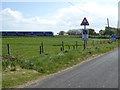 C7835 : Passing train, Grange Beg / Ballywollen by Kenneth  Allen