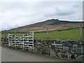 Farmland with open access moorland above