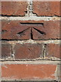 Bench mark in front of Ysgol Estyn, Hawarden Road, Hope