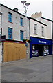 Boarded-up former Stead & Simpson shoe shop in Bridgend town centre