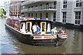 View of a narrowboat passing along the Regent