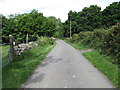 Dolmen Road approaching the bridge over the Leitrim River