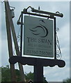 Sign for the Swan public house, Hilborough