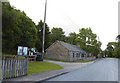 Noticeboard and house at Calvine