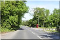 Junction of A4 with Barnfield and a phone box