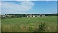 View across field to Bishton from the railway