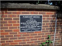 SU9456 : Pirbright Bridge, Plaque by Len Williams