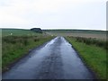 NY7166 : Unfenced road west of Cawfields by Graham Robson