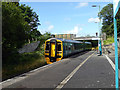 SH4236 : A train for Pwllheli departing from Penychain by John Lucas